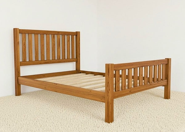 Sandringham Shaker solid oak bed frame with vertical slats and strong wooden base.