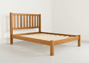Sandringham Shaker solid oak bed frame with slatted headboard and strong wooden slats.