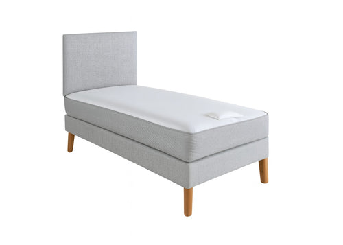 Grey linen upholstered shallow divan base with headboard, non-slip top, and wooden legs.