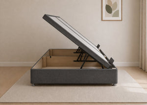 Charcoal fabric side lift ottoman bed with thick corner posts and reinforced storage base, open to show gas-assisted mechanism.
