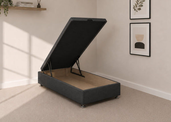 Single charcoal grey fabric end lift ottoman bed with open storage base and reinforced gas pistons.