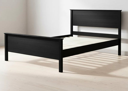 Stavern Pine Bed: Black solid Scandinavian pine bed frame with a minimalist design and sturdy wooden slats.