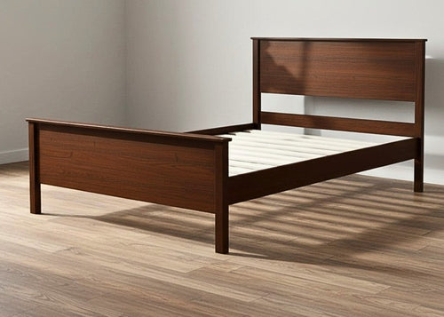 Stavern Pine Bed: Dark brown solid pine bed frame with a slatted headboard and footboard, featuring white wooden slats.