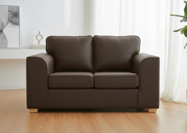 Titan Sofa finished in Chocolate Brown Vinyl with light wood feet