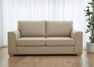 Titan sofa finished in Natural Weave shown with light wood feet