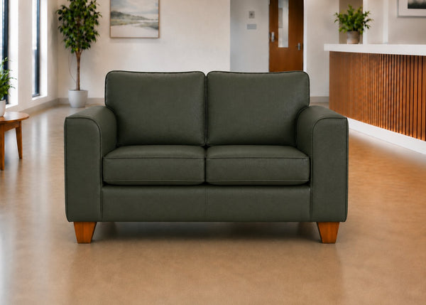 Titan Challenging Behaviour 2 Seater Sofa in Aston Bottle Green Vinyl Finish