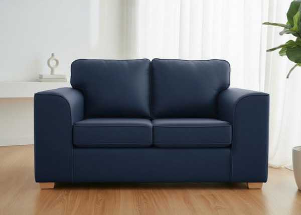 Titan Sofa finished in Blue Vinyl with light wood feet