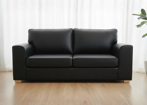 Titan sofa finished in Black vinyl shown with light wood feet