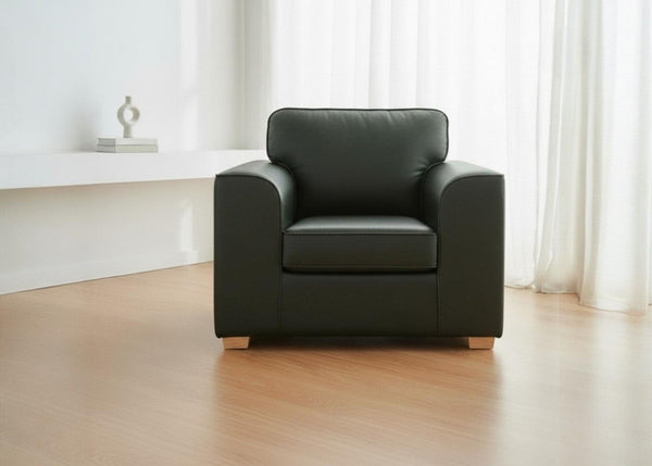 Titan Armchair in Aston Bottle Green Vinyl Finish