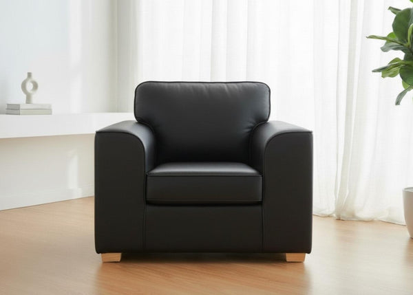 Titan Chair Finished in Black vinyl with light wood feet