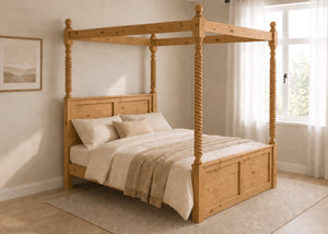 Warsaw Four Poster bed, natural wood finish, substantial corner posts, slatted base, and tall vertical posts in antique.
