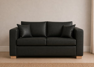 Willow Sofa Bed in Black Faux Leather with Natural Feet